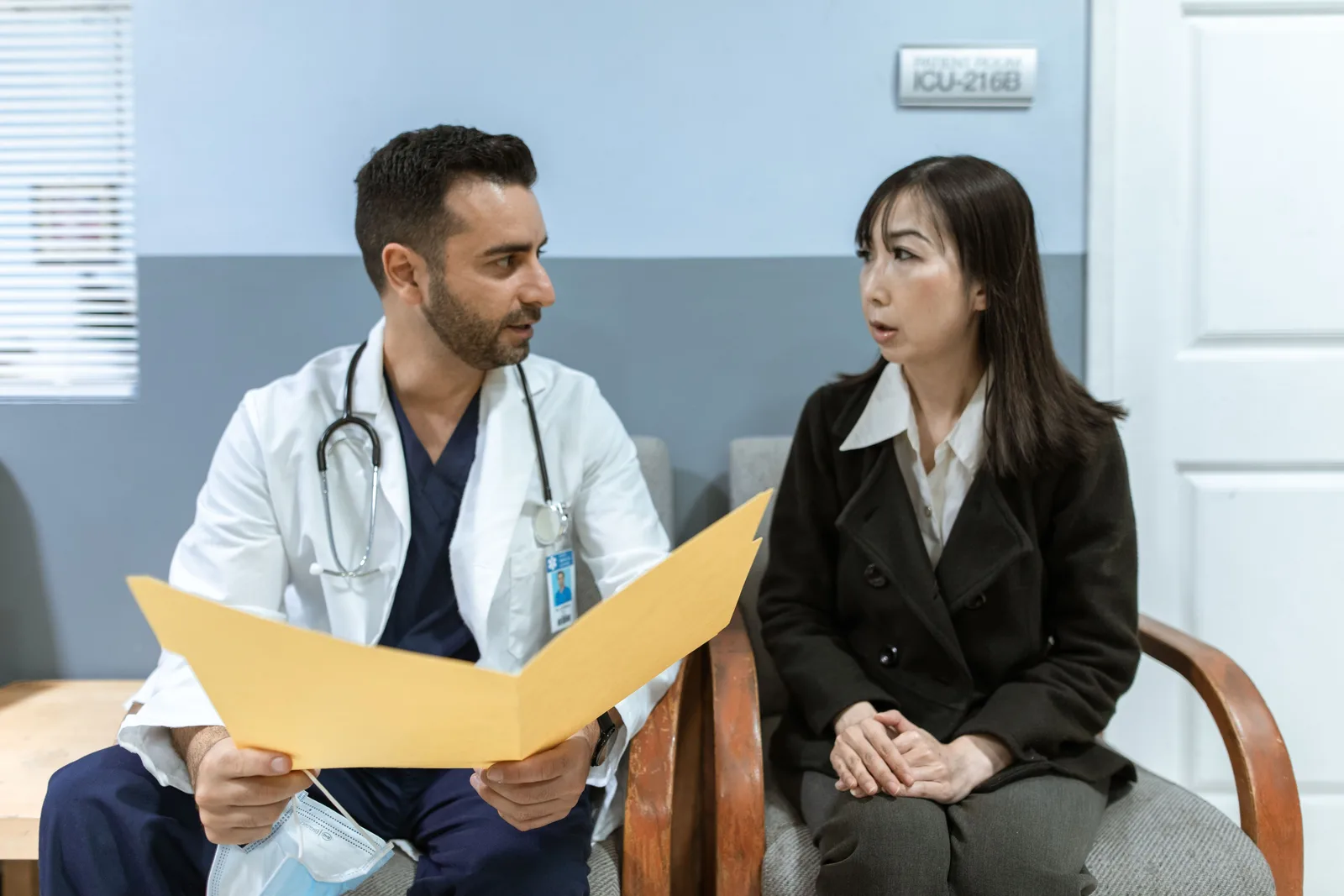 Doctor reviewing medical results with a patient