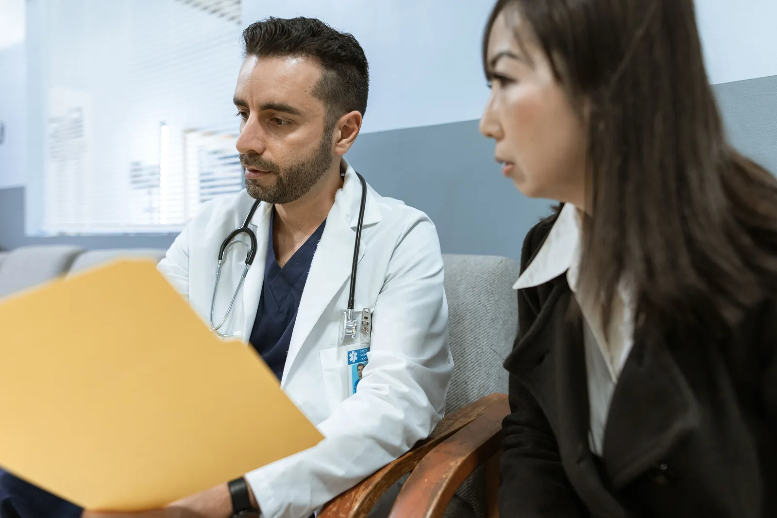 Doctor reviewing test results with a patient