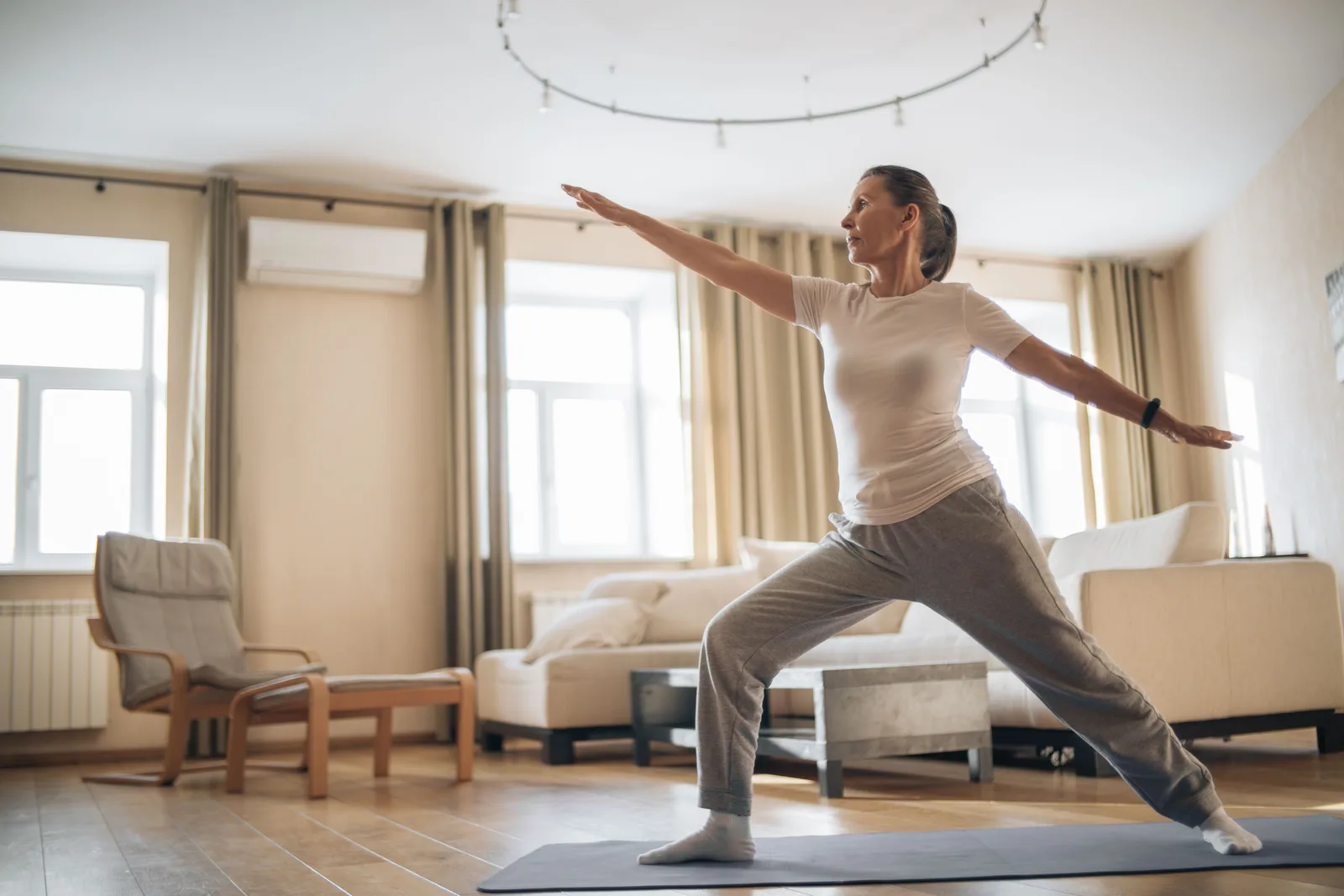 Person practicing yoga at home
