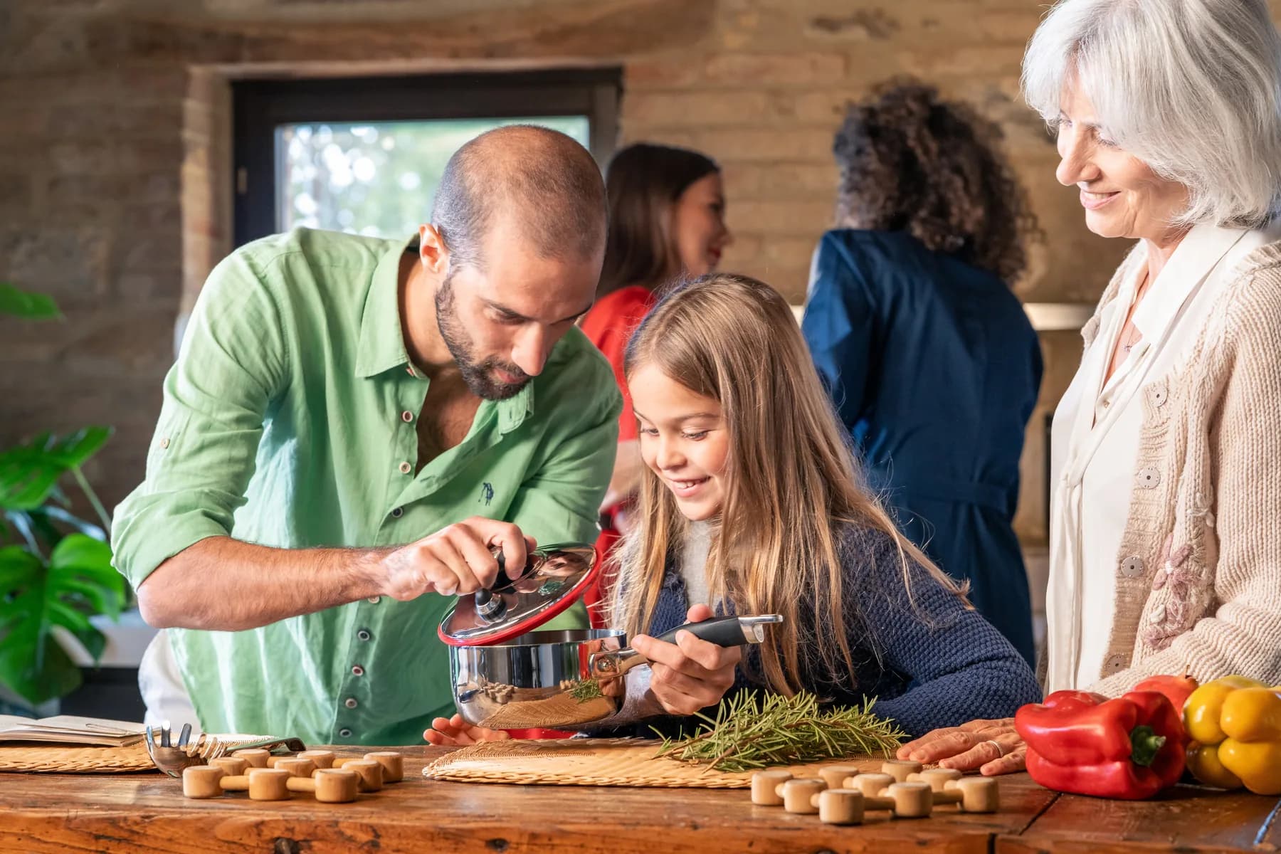 Family preparing a meal together at home